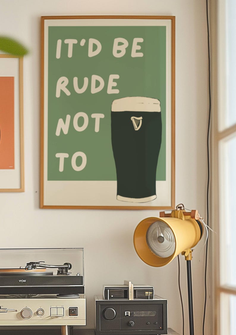 May include: A green poster with the text "It'd be rude not to" and a black and white illustration of a pint of beer.