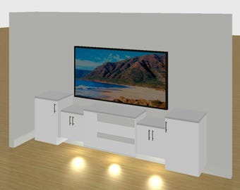 May include: A modern entertainment center with a large flat-screen TV displaying a scenic landscape. The white cabinet has two side storage units and a central open shelf. The unit is illuminated by three recessed lights.