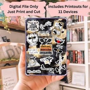 May include: A collection of digital stickers with fantasy-themed designs, including dragons, wings, and text like "In My Onyx Storm Era" and "Fly...Or Die." The stickers are on a black and gold background, with text that reads "Digital File Only Just Print and Cut" and "Includes Printouts for 11 Devices."