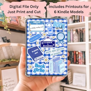 May include: A digital file for Kindle models featuring a blue gingham pattern with book-themed stickers. The stickers include phrases like "Book Nerd," "Closed for Reading," and "Probably Smut." The image also includes the text "Digital File Only Just Print and Cut."