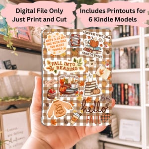 May include: A digital printable set of fall-themed stickers for Kindle devices. The stickers feature a plaid background with various fall-themed illustrations, including pumpkins, books, coffee cups, and leaves. The text on the stickers includes "Fall into Reading", "Pumpkin Spice and Smutty Books", and "Hello Fall".