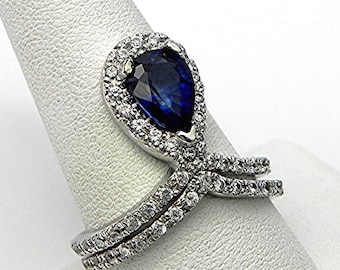 AAAA Blue Sapphire   10x7mm  2.41 Carats   Manmade 14K White gold diamond (.70 Carat TW.) Halo Bridal set. 2367