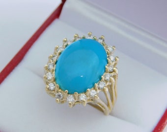 AAAA Kingman Mine Turquoise  5.65 carats 16x12mm  in 14K yellow gold 6.5 grams Diamond halo ring with .75 carats of Diamonds 3001