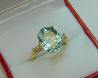 AAAA Aquamarine  12.5x9.5mm  3.59 Carats   Natural Untreated Oval Engagement ring with .30 cts of Diamonds 14K Yellow gold.  3103