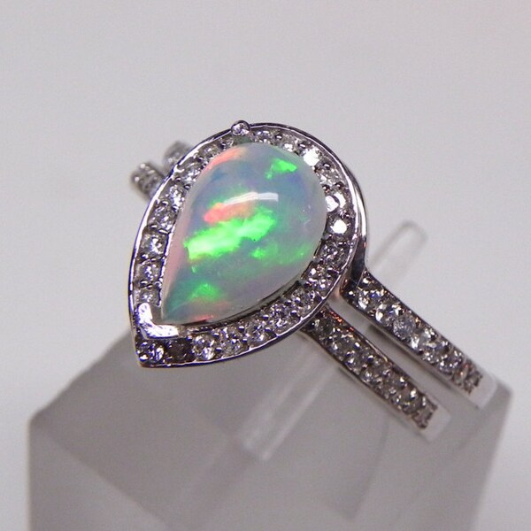 AAA Australian white Opal 0.86cts  in 14K White gold Bridal set .40cts of diamonds. 1619