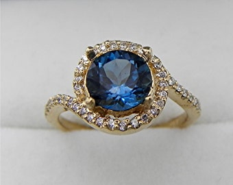 AAAA London Blue Topaz   7.04mm  1.57 Carats   Round Halo diamond engagement ring in 14K Yellow gold. 2110(2)