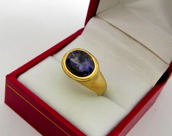 AAAA Iolite Violet Blue   11x9mm  2.92 Carats   in Ladies 18K Yellow gold cocktail ring 10 grams. 2632