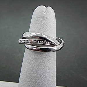 18K Tri color gold rolling Wedding rings 18K white gold with .75 carats of Diamonds MMM