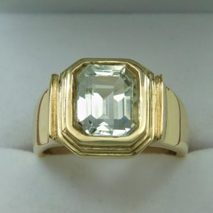 AAAA Super White Topaz 10x8mm 4.71 Carats Heavy 14K Yellow gold Emerald cut Mans Ring 14 to 15 grams  Flawless Natural Untreated  3015