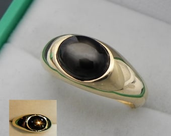 AAA Czarny szafir gwiaździsty kaboszon 9 x 7 mm 2,85 ct 14k pierścionek ze złota żółtego 8 gramów 0155