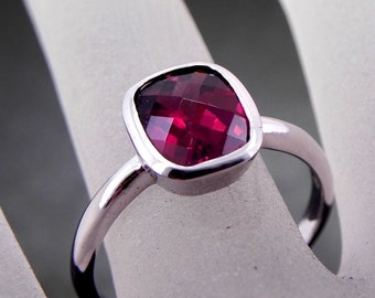 AAAA Natural Raspberry Red Rhodolite Garnet   10x8mm  3.24 Carats   in 14K white gold Bezel set  ring and available in yellow gold MMM