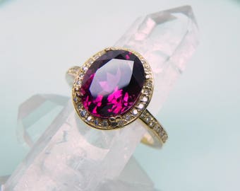 AAAA  Rhodolite Garnet   10x8mm  3 Carats  14K Yellow gold Halo engagement w/ .30 Cts of diamonds.  3012