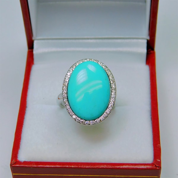 AAAAA Super Rare Turquoise from Kingman Mine 18x13mm  7.21 Carats   18K Yellow gold Diamond halo cabochon ring.  9 grams 4022