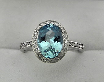 AAAA  Aquamarine 9x7mm 1.41 Carats 14K White gold Halo engagement ring w/ .20 Cts of diamonds. 0751