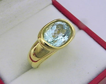 AAA  Blue green Aquamarine 2.95 carats  11x9mm in 14K Yellow gold bezel set ring.  0257