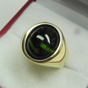AAAA Green Tourmaline 13x10mm    7.01 Carats   in Heavy 18K Yellow gold ring 15 grams 2816