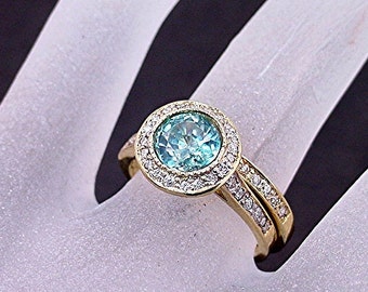 AAA Blue Zircon   7mm  1.93 Carats   Round in 14K Yellow gold diamond bridal set. B007 0787 MMMM