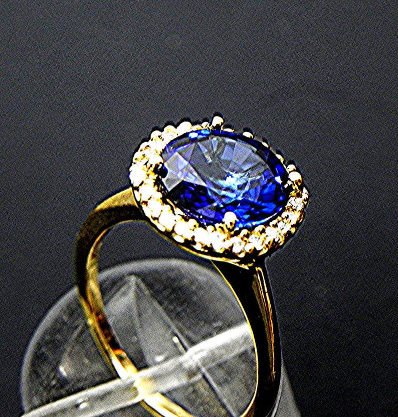 AAAA Blue Sapphire 10mm 5.00 carats in 14K White gold Diamond Halo ring with .25 carats of diamonds MMM image 8