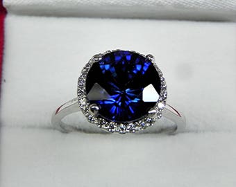 AAAA  Blue Sapphire  10mm  5.00 carats   in 14K White gold Diamond Halo ring with  .25 carats of diamonds MMM