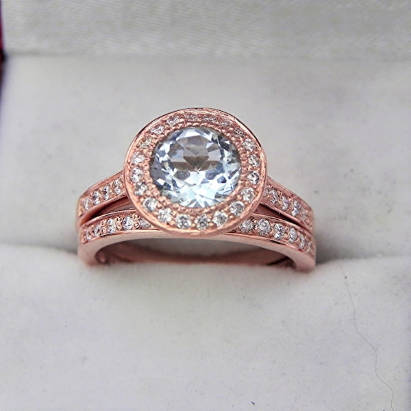 AAA Round Blue Aquamarine   7.0mm  1.20 Carats   14K Rose gold bridal set with .35cts of diamonds. MMMM