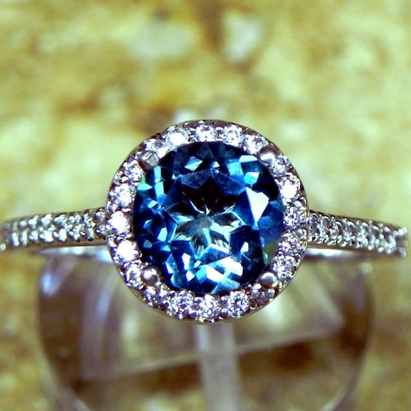 London Blue Topaz Round   7.00mm  1.50 Carats   in 14K white gold Halo ring with .30 carats of diamonds MMM 4003 DDD