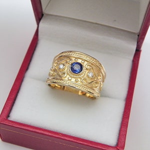 AAAA Blue Sapphire   4.00mm  .35 Carats   in 14K Yellow gold Byzantine-style Etruscan cigar band diamond ring (.06 carats) 3651W