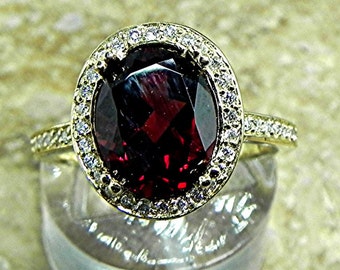 AAA Pyrope Garnet   10x8mm  3.10 Carats   in a 14K Yellow gold ring with diamonds (.32ct) Ring 1817 ddd