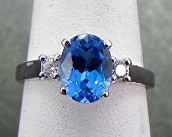 Blue Topaz   8x6mm  1.40 Carats   with .12 cts of Diamonds 14K white gold ring 1060