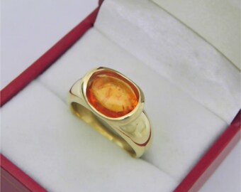 AAAA Orange Spessartite Garnet 3.50 carats  10x8mm in 14K Yellow gold bezel set ring. 9 grams 254