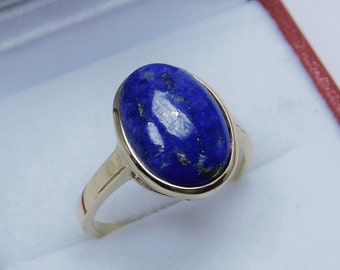 AAA Lapis  3.76 Carats  14x10mm  Bezel set in 14K Yellow gold ring 0051