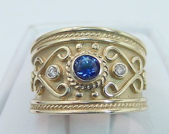 AAAA Blue Sapphire   4.00mm  .36 Carats   in 14K Yellow gold Byzantine-style Etruscan cigar band diamond ring (.06 carats) 0404