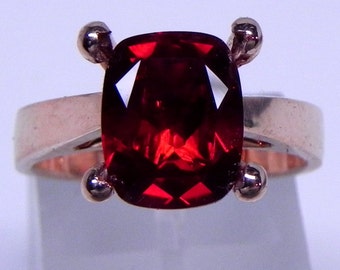 AAAAA Red Andesine   10x8mm  2.09 Carats   in a 14K Rose gold cathedral style engagement ring.  1928