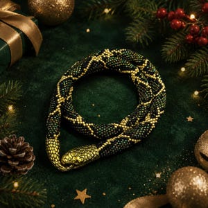 May include: A beaded necklace featuring a flexible, tubular body with a dark green and black diamond pattern. The necklace terminates in a metallic gold-toned snake head clasp, with the snake's head and tail meeting to form a continuous loop.