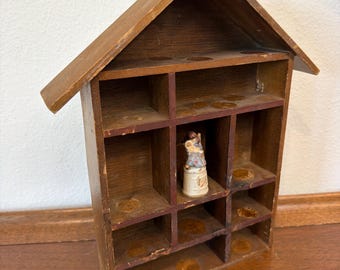 vintage wooden house-shaped curio or trinket shelf