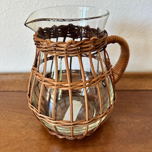 Rattan wicker wrapped glass cage pitcher