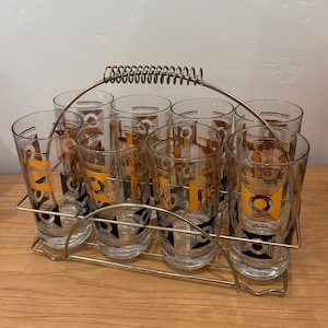 Vintage MCM black and gold 8 highball drinking glasses with  carrier caddy