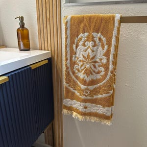Vintage Gold and cream towel