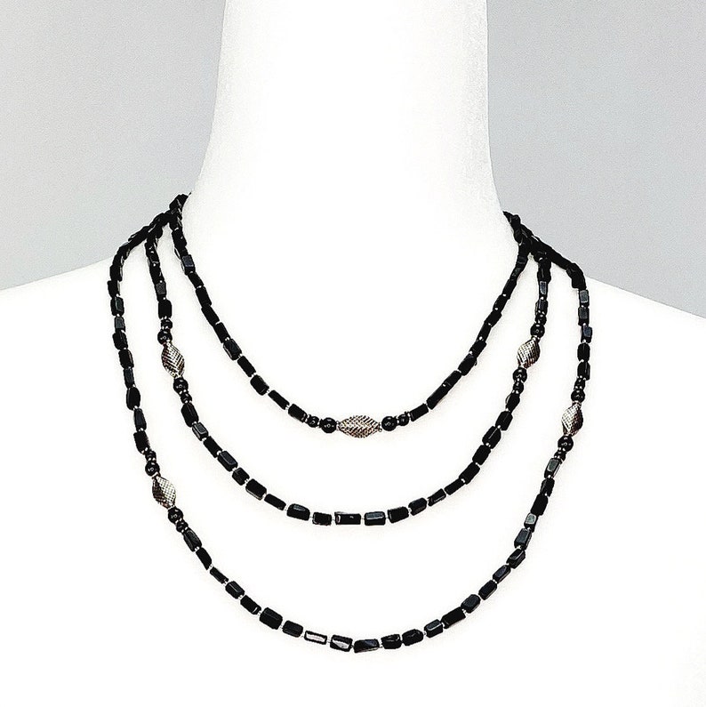 Collana di conchiglie con parti di lumaca e Shivaeye, Bali fatta a mano - Italia