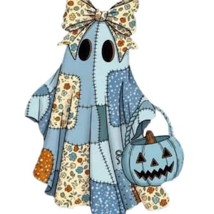 May include: A ghost-shaped wall hanging featuring a patchwork design of light blue, cream, and orange floral patterns. The ghost has two dark oval eyes, a large bow on its head, and carries a light blue jack-o'-lantern bucket with a carved face.