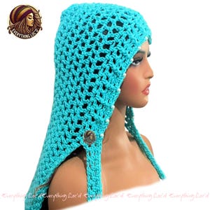 May include: A turquoise crochet head covering with a button closure and pearl accents. The head covering has a long, draped back and is designed to cover the head and neck. The logo "Everything Loc'd" is visible in the upper left corner and along the bottom.