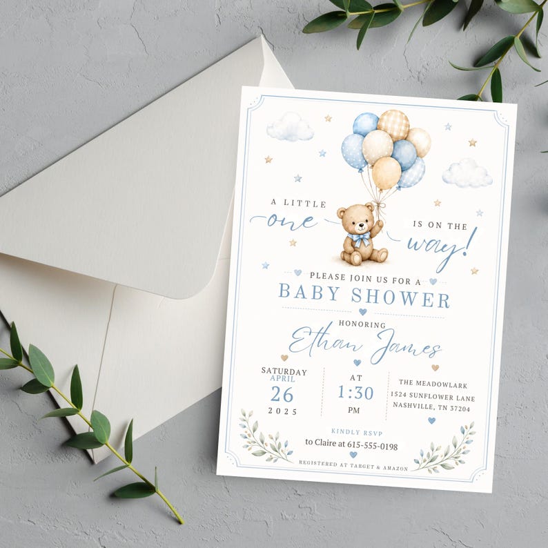May include: A white baby shower invitation card featuring a watercolor illustration of a teddy bear holding blue, tan, and plaid balloons. The text reads A LITTLE one IS ON THE WAY! BABY SHOWER, Ethan James, Saturday April 26 2025, 1:30 PM, and registry info.
