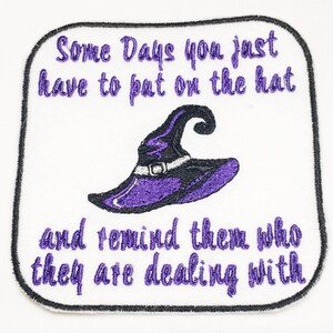 May include: Embroidered iron-on patch with a purple witch hat and the text "Some Days you just have to pat on the hat and remind them who they are dealing with."