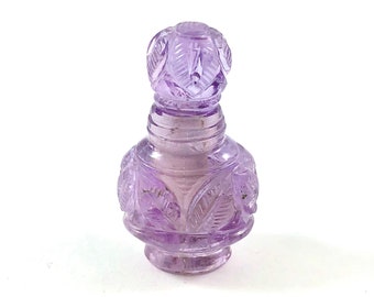 Amethyst carved miniature perfume bottle with lid that opens 32.61 carats