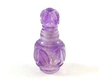 Amethyst carved miniature perfume bottle with lid that opens 32.64 carats
