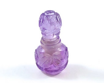 Amethyst carved miniature perfume bottle with lid that opens 16.39 carats