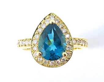 London blue topaz pear with diamond halo set in yellow gold ring - Choose your ring size