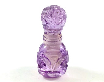 Amethyst carved miniature perfume bottle with lid that opens 27.22 carats