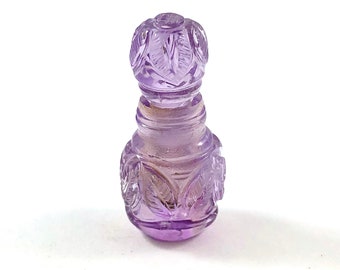 Amethyst carved miniature perfume bottle with lid that opens 20.52 carats