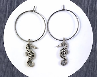 Aged silver seahorses black oxidised hoop wire dangle earrings