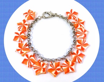 Vintage orange swirl fun star candy plastic charm bracelet